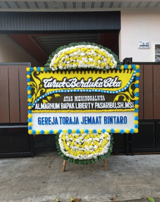 Papan Bunga Duka di Turida